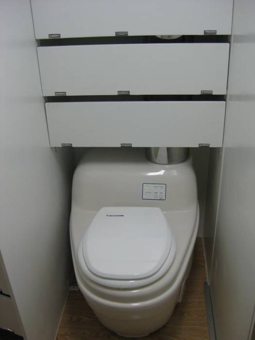 Stealth Camper Cabinets over Toilet